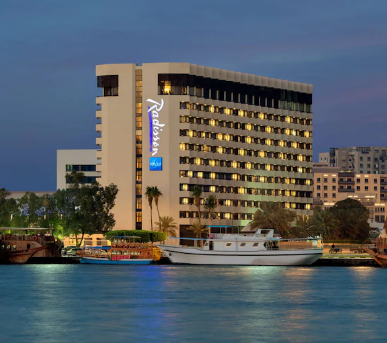 Radisson Blu Dubai Deira Creek front view at dawn