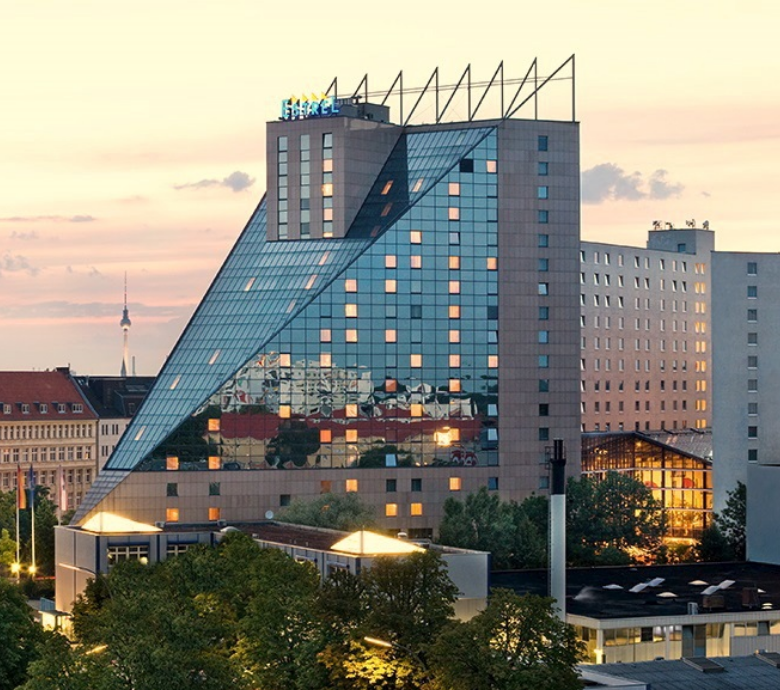 front view of Hotel Estrel Berlin at dawn